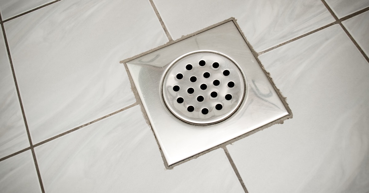Hospital bathroom floor drain using a floor drain trap seal to help prevent the transmission of nosocomial infections.